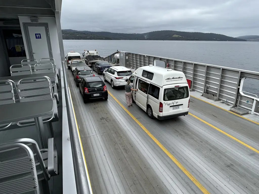 Vehicles lined up aboard the Bruny Island ferry between Kettering and Roberts Point