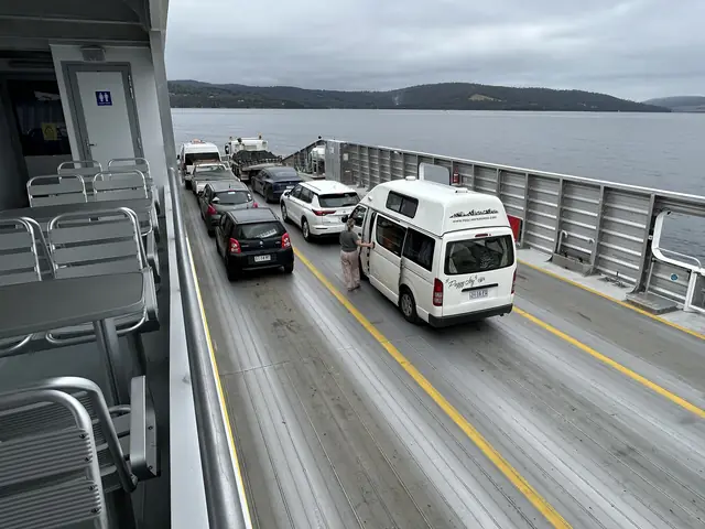 Vehicles lined up aboard the Bruny Island ferry between Kettering and Roberts Point