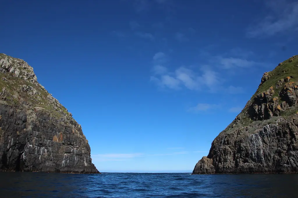 The Friars rock stacks off the southern tip of Bruny Island seen from a cruise