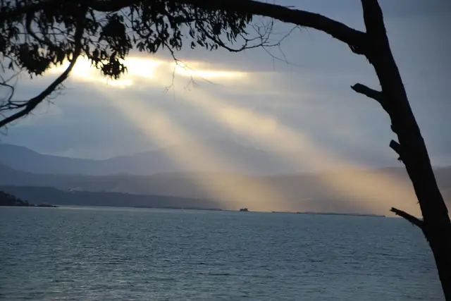 Rays of light through cloud over D'Entrecasteaux Channel from Lunawanna, Bruny Island